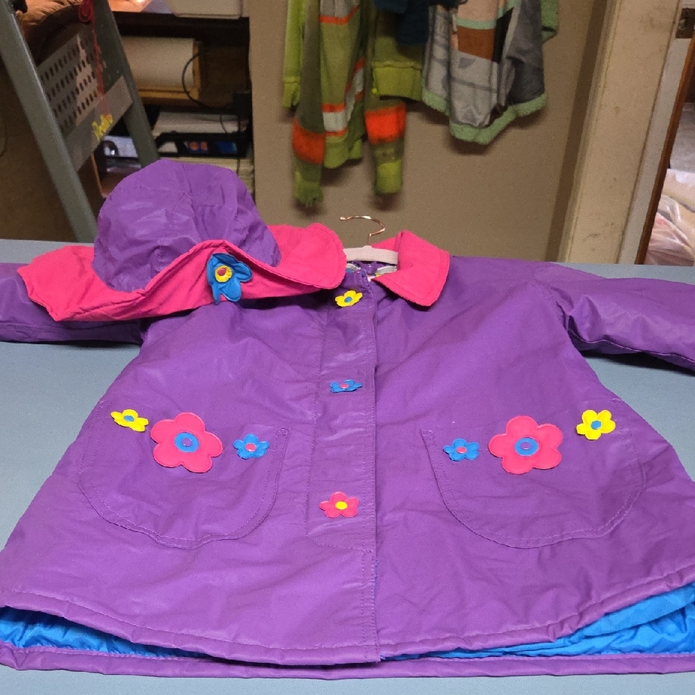 Charming Purple Kids Raincoat with Floral Design